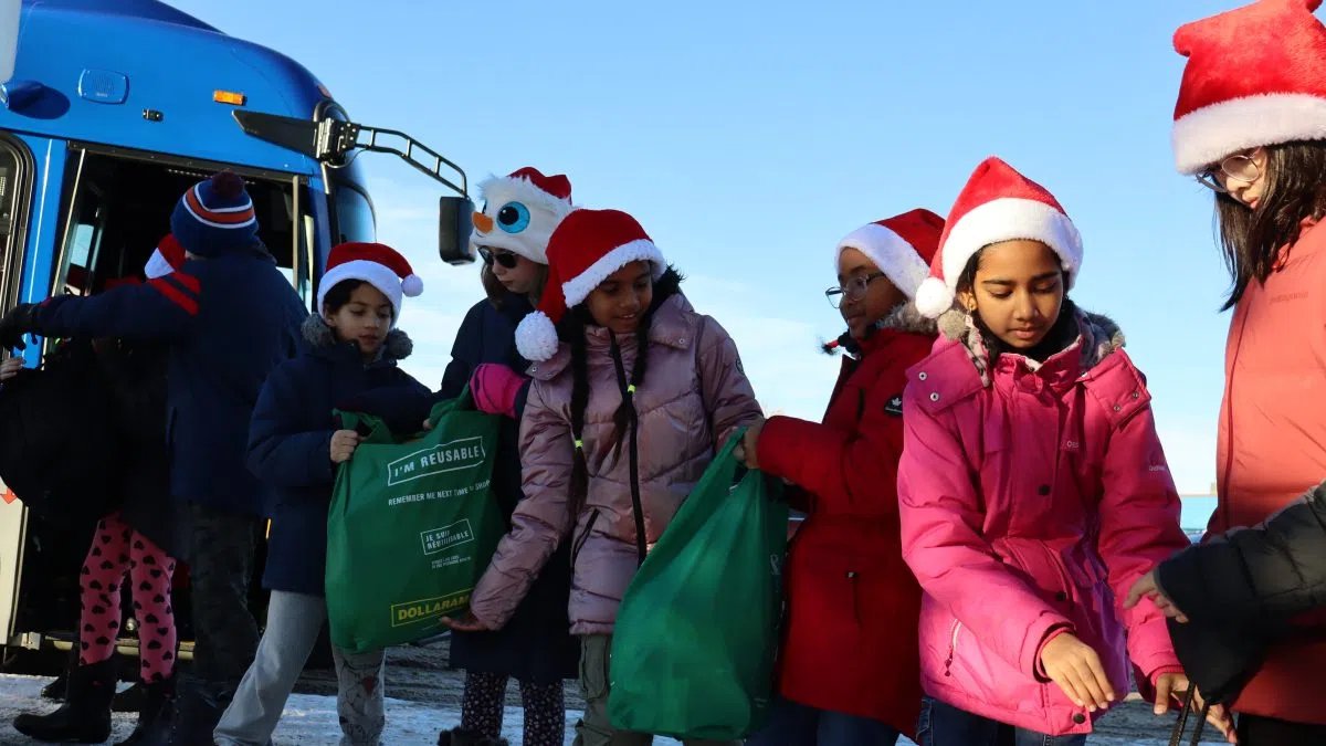 Students ‘Stuff A Bus’ to Help Those in Need Ahead of the Holidays